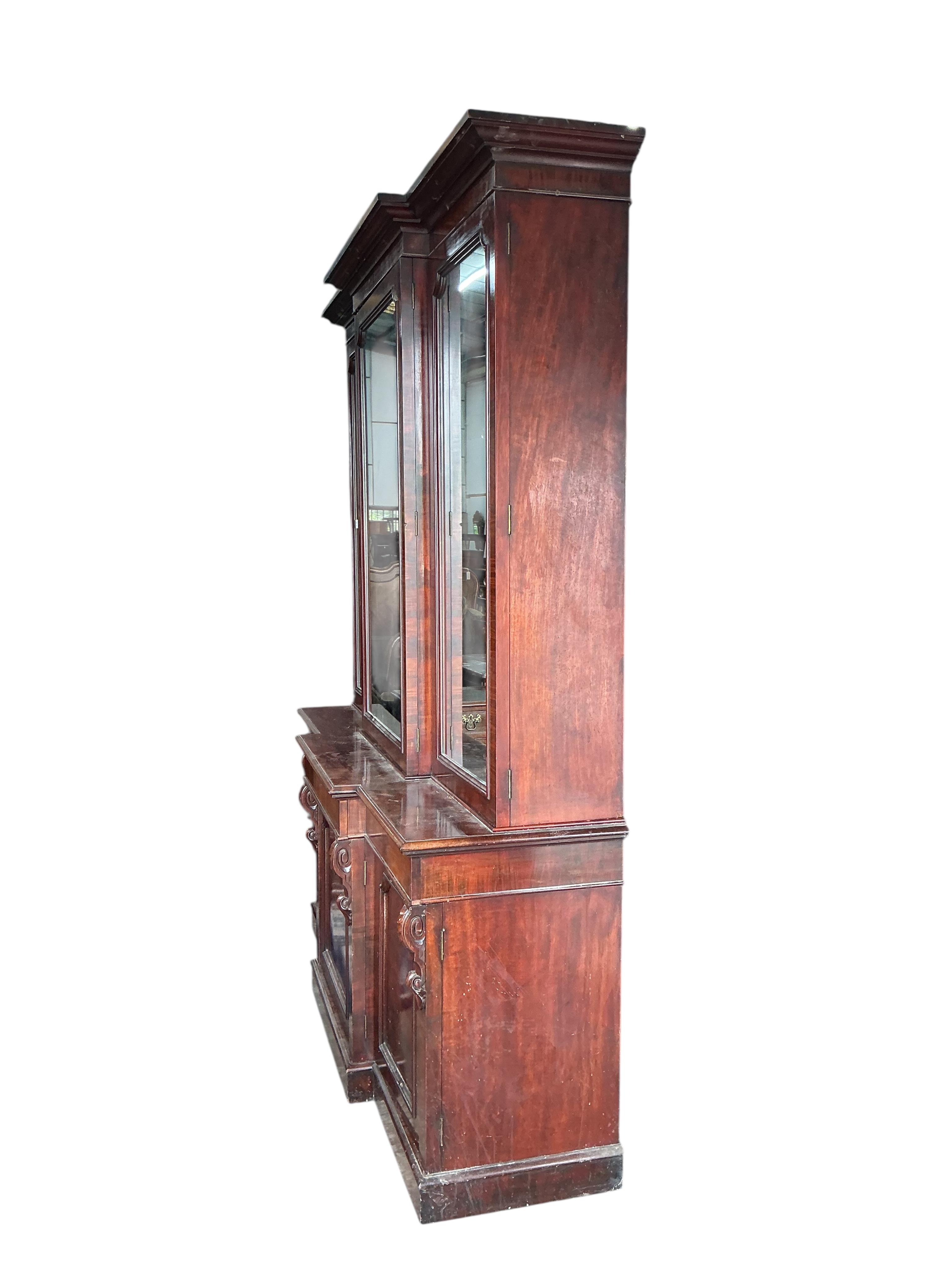 A Victorian mahogany breakfront library bookcase, width 200cm, depth 54cm, height 238cm